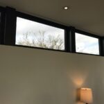 Modern clerestory windows bringing natural light into living space