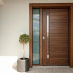 Modern wooden front door with vertical glass side panels
